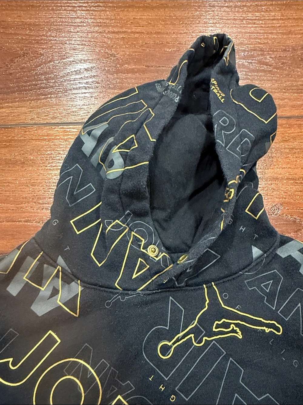 Jordan Men’s Black & Gold All-Over Logo Hoodie